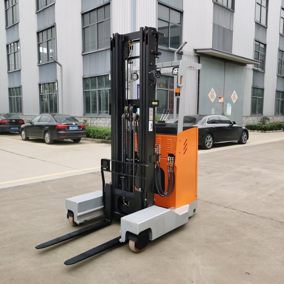 Stand-on type for large capacity high lift reach stacker trucks